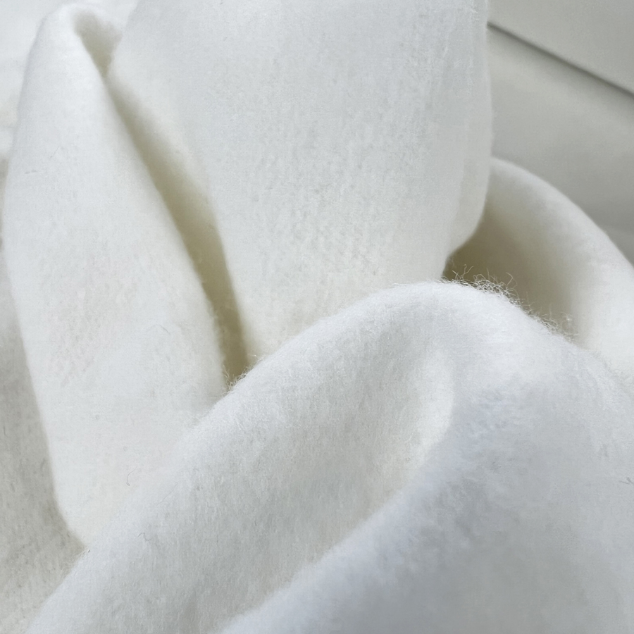 https://www.croftmill.co.uk/images/pictures/00-2023/03-march-2023/winters_hug_white_brushed_cotton_fleece_thick_woven_fabric_cu.jpg?v=8ba37162