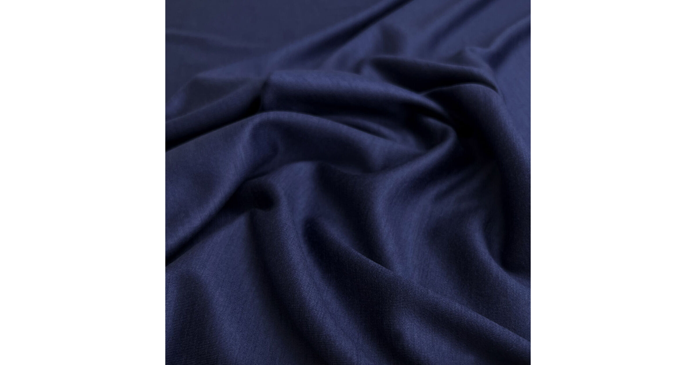 Blue Knitted Stretch Dressmaking Fabric | Wool Jersey - Indigo