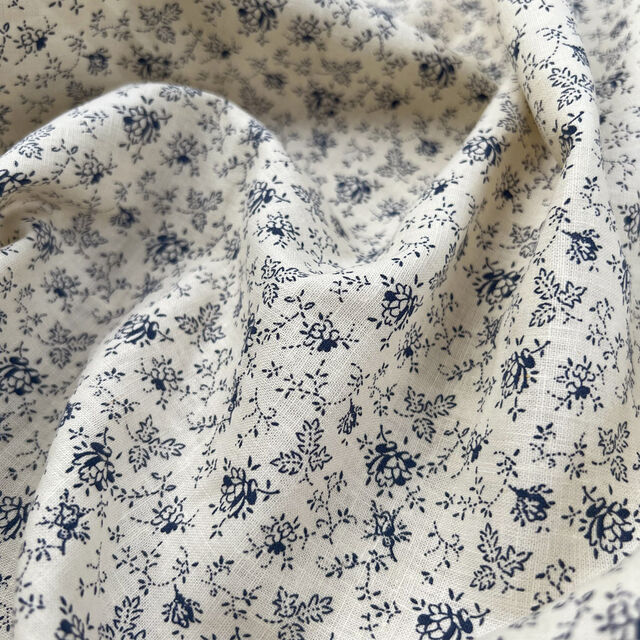 https://www.croftmill.co.uk/images/pictures/00-2024/03-march-2024/linen_mix_lauren_cotton_cream_navy_floral_ex_designer_dress_fabric_cu-(product).jpg?v=eb7db4e0