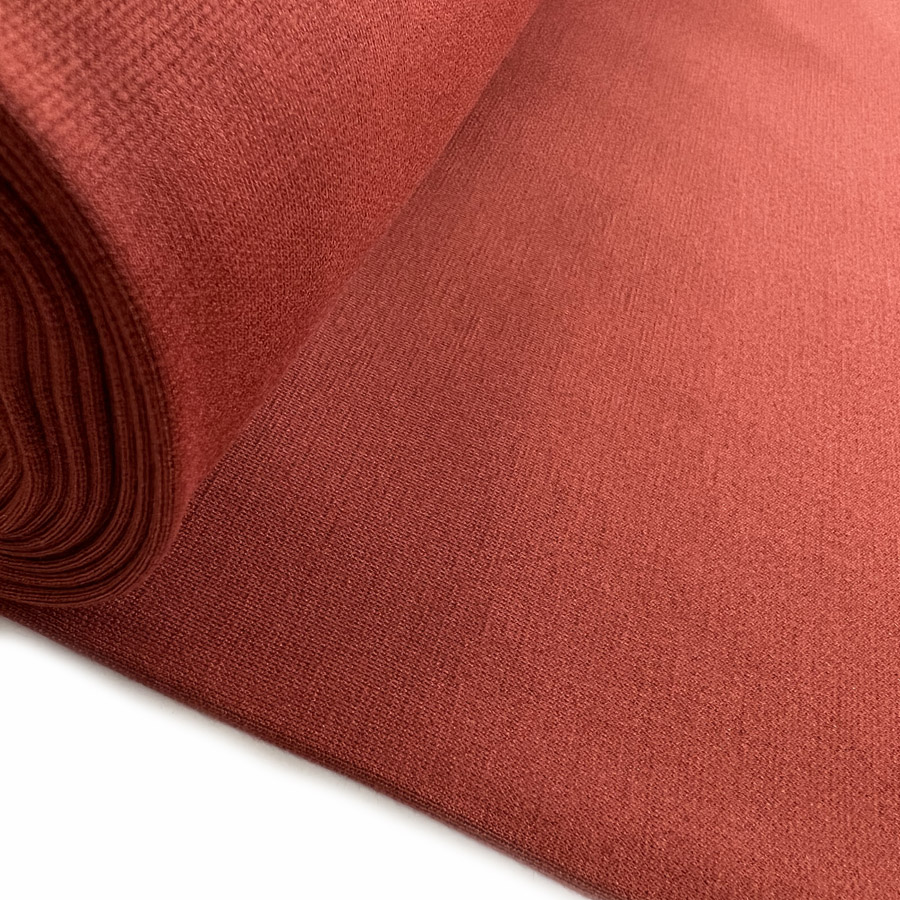 https://www.croftmill.co.uk/images/pictures/2022/10-october-2022/luxury_ponte_rust_oeko_tex_dressmaking_fabric_roll.jpg?v=a032049d