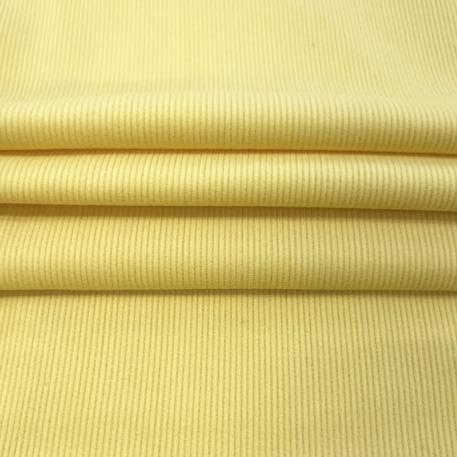 https://www.croftmill.co.uk/images/pictures/2022/10-october-2022/super_soft_18wale_needlecord_dress_fabric_yellow_fold.jpg?v=975e7e78